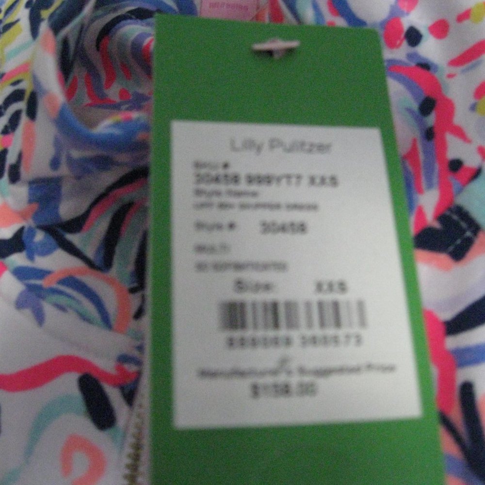 Lilly Pulitzer new with tags, long sleeve, short zipper at neck,  with  pockets